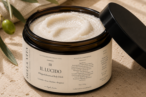 Il Lucido Whipped Botanical Sugar Polish – open jar showing whipped texture with olive branch